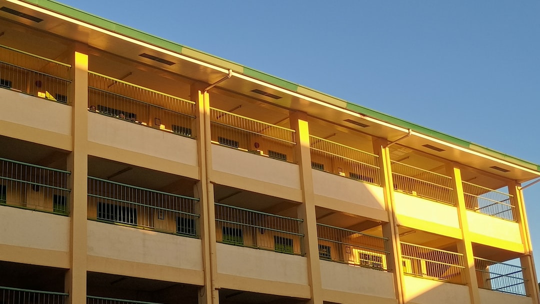 a tall building with balconies and balconies on each floor